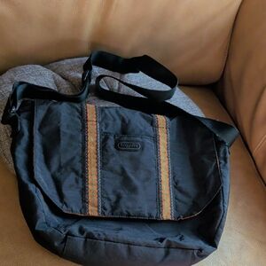 Black and Orange Bag with Adjustable Strap. no rips or stains.